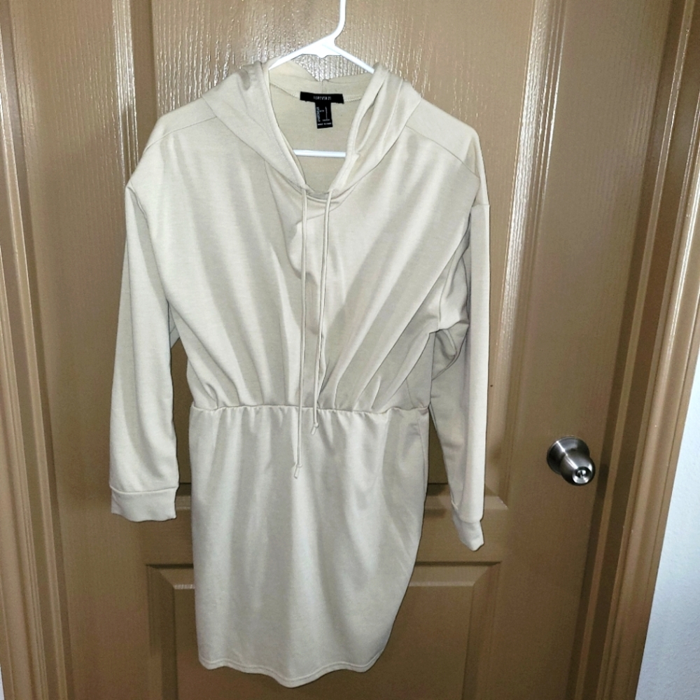 Sweater dress. Beige